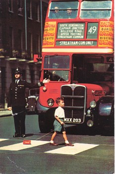 Featured is an adorable postcard image of a little boy pulling his toy double decker bus in front of a real London double decker bus. Too cute.  The original postcard is for sale in The unltd.com Store.